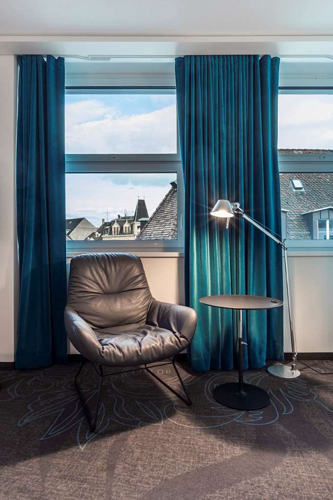 Motel One Freiburg Номер фото