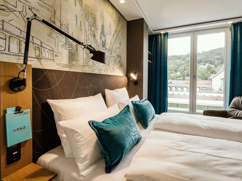 Motel One Freiburg Номер фото