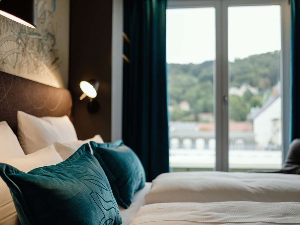 Motel One Freiburg Номер фото